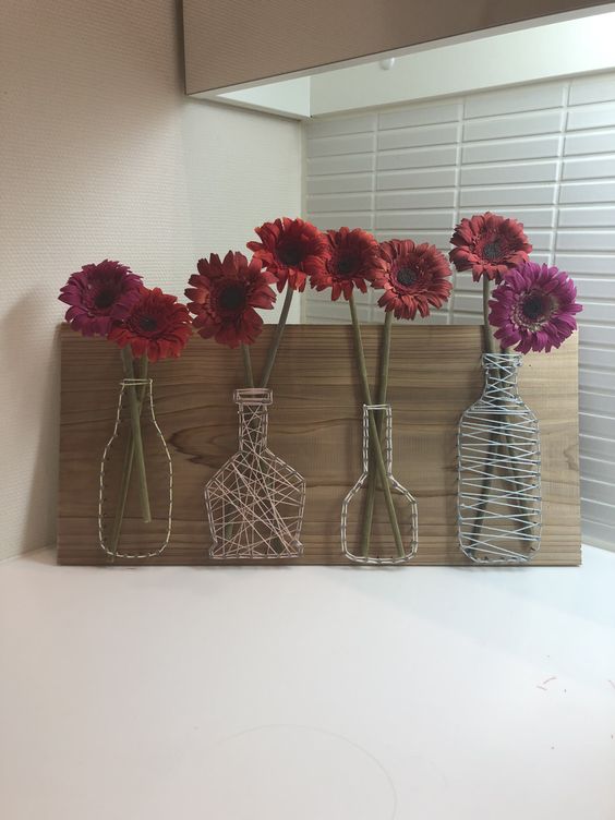 vasos de flores feitos com pregos e corda 8