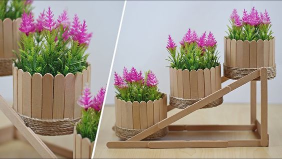 vasos de plantas feitos com palitos de picole